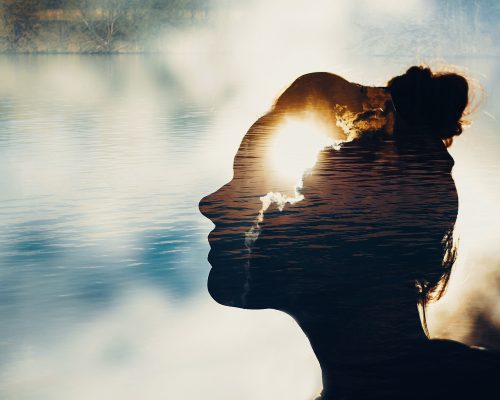 Woman with sun in the mind, in nature